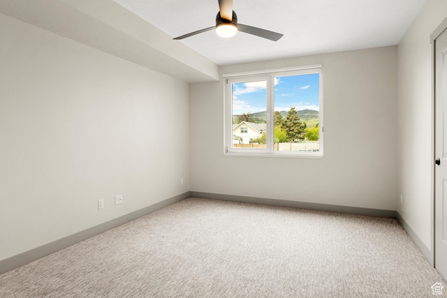 35 E 150th St S Unit D101, Garden City, UT 84028 - spare room with carpet, a ceiling fan, and baseboards