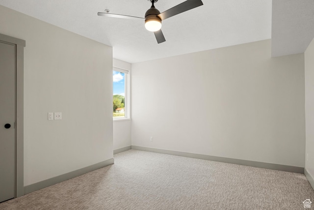 35 E 150th St S Unit D101, Garden City, UT 84028 - carpeted spare room with a ceiling fan and baseboards
