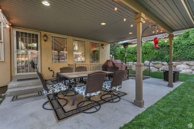 view of patio with outdoor dining area