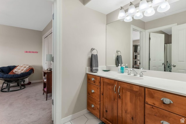 bathroom featuring vanity and baseboards