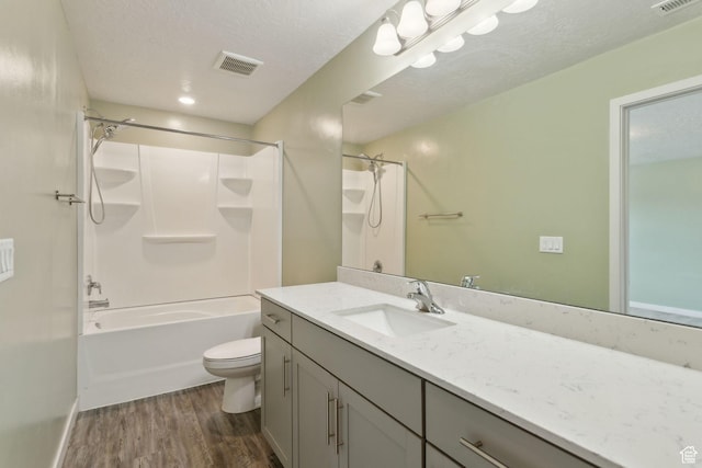 3714 W Soft Whisper Way, Herriman, UT 84096 - full bathroom with wood finished floors, toilet, vanity, and shower / tub combination