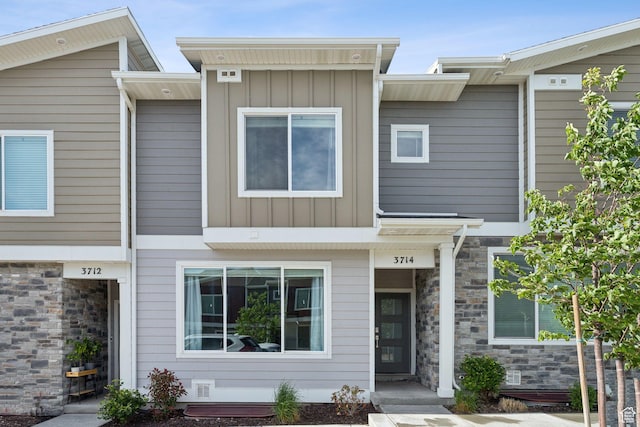 3714 W Soft Whisper Way, Herriman, UT 84096 - townhome / multi-family property featuring board and batten siding and stone siding