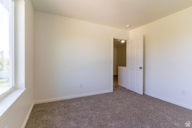 886 Cambridge Dr, North Salt Lake, UT 84054 - empty room with carpet floors, baseboards, and a smoke detector