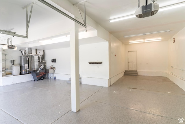 886 Cambridge Dr, North Salt Lake, UT 84054 - garage featuring a garage door opener, water heater, and heating unit