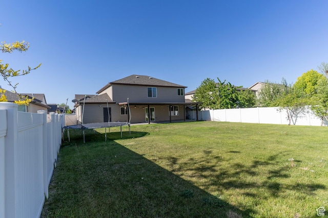 886 Cambridge Dr, North Salt Lake, UT 84054 - back of property with a trampoline