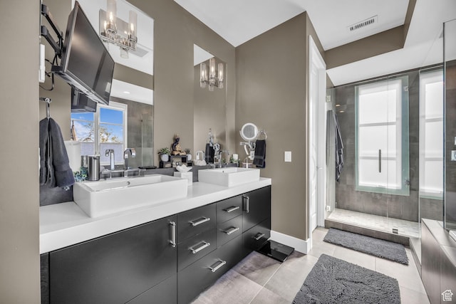 54 N B St, Salt Lake City, UT 84103 - full bath with a chandelier, a shower stall, plenty of natural light, and double vanity