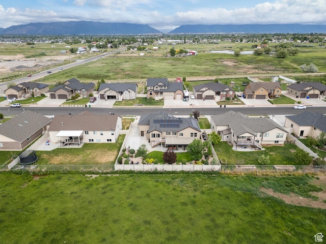aerial view of residential area with mountains