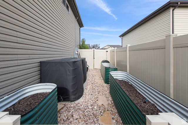 view of side of property with a fenced backyard