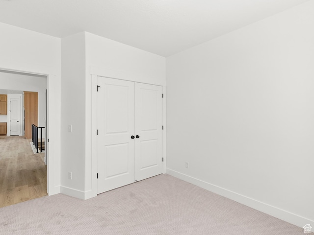 1427 N 290 E Unit 02, Salem, UT 84653 - unfurnished bedroom with light colored carpet and a closet