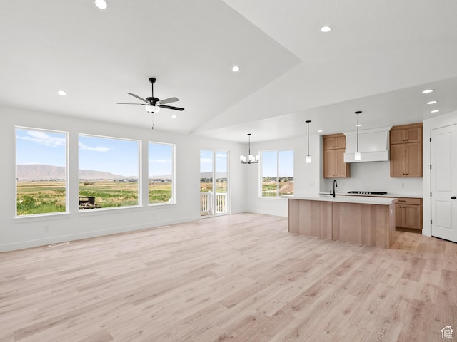 1427 N 290 E Unit 02, Salem, UT 84653 - kitchen featuring open floor plan, light countertops, light wood-style flooring, vaulted ceiling, and a ceiling fan