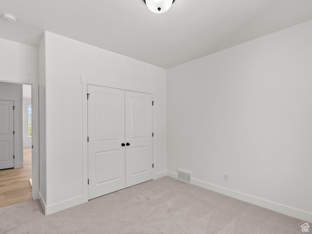 1427 N 290 E Unit 02, Salem, UT 84653 - unfurnished bedroom with carpet and a closet
