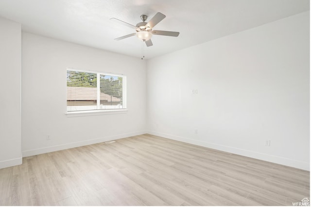 172 S 880 E, American Fork, UT 84003 - unfurnished room featuring light wood-style floors, baseboards, and a ceiling fan