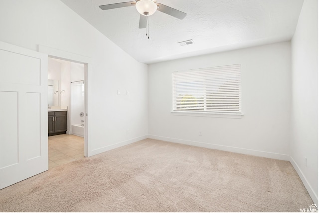 172 S 880 E, American Fork, UT 84003 - empty room with light carpet, ceiling fan, baseboards, lofted ceiling, and light tile patterned flooring