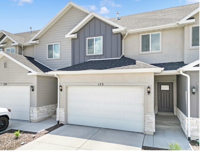 172 S 880 E, American Fork, UT 84003 - multi unit property featuring stone siding, board and batten siding, concrete driveway, and roof with shingles