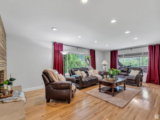 4131 S Fortuna Way E, Salt Lake City, UT 84124 - living area with light wood-type flooring, plenty of natural light, recessed lighting, and baseboards