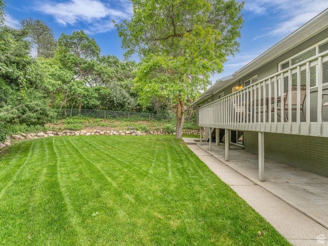 4131 S Fortuna Way E, Salt Lake City, UT 84124 - view of yard with a patio and a deck