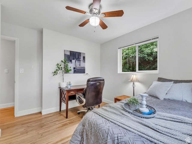 4131 S Fortuna Way E, Salt Lake City, UT 84124 - bedroom with light wood finished floors, baseboards, and ceiling fan