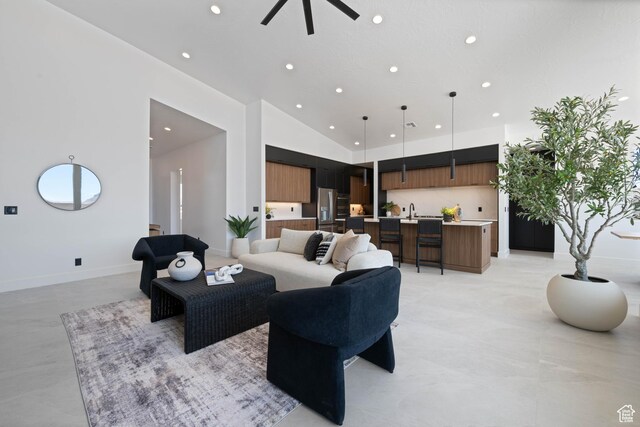 1575 W 840 S, Hurricane, UT 84737 - living room with recessed lighting, a ceiling fan, finished concrete floors, baseboards, and high vaulted ceiling