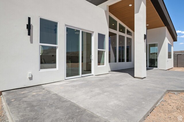 1575 W 840 S, Hurricane, UT 84737 - back of house featuring stucco siding and a patio area