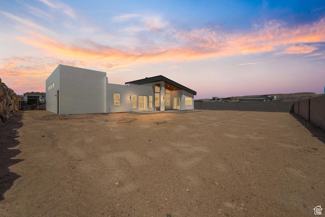 1575 W 840 S, Hurricane, UT 84737 - back of house with a fenced backyard and stucco siding
