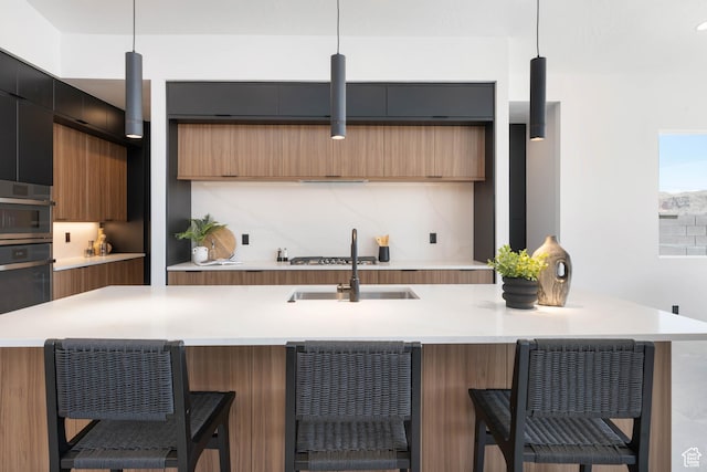 1575 W 840 S, Hurricane, UT 84737 - kitchen featuring modern cabinets, a sink, and light countertops