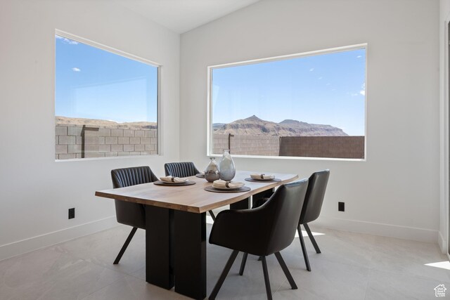 1575 W 840 S, Hurricane, UT 84737 - dining space featuring baseboards, a mountain view, and tile patterned floors
