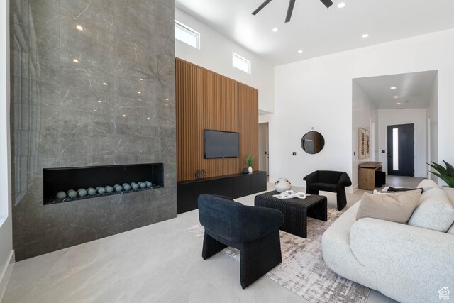 1575 W 840 S, Hurricane, UT 84737 - living area with ceiling fan, a towering ceiling, a fireplace, and recessed lighting