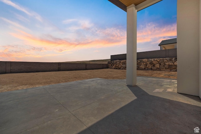 1575 W 840 S, Hurricane, UT 84737 - patio terrace at dusk with a fenced backyard