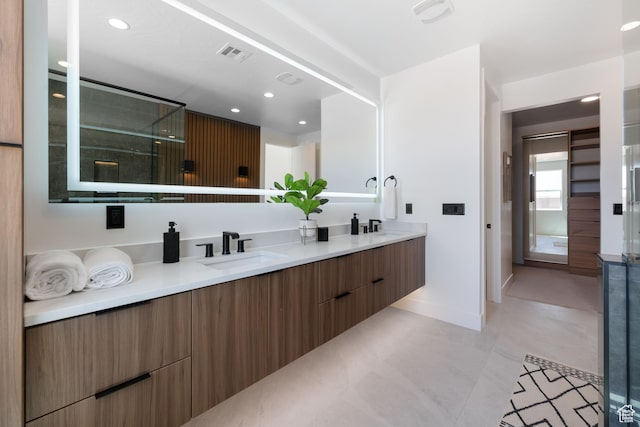 1575 W 840 S, Hurricane, UT 84737 - bathroom featuring double vanity, baseboards, recessed lighting, and a shower