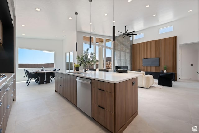 1575 W 840 S, Hurricane, UT 84737 - kitchen with modern cabinets, a sink, a towering ceiling, dishwasher, and a kitchen island with sink