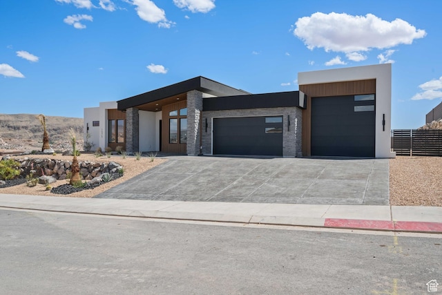 1575 W 840 S, Hurricane, UT 84737 - contemporary home featuring a garage, driveway, and stucco siding