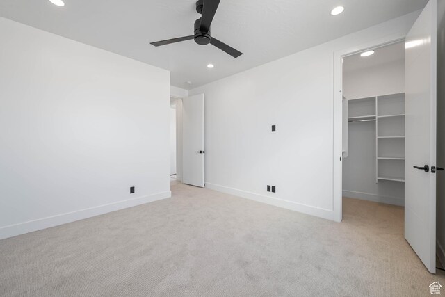 1575 W 840 S, Hurricane, UT 84737 - unfurnished bedroom with recessed lighting, light carpet, a walk in closet, baseboards, and a closet