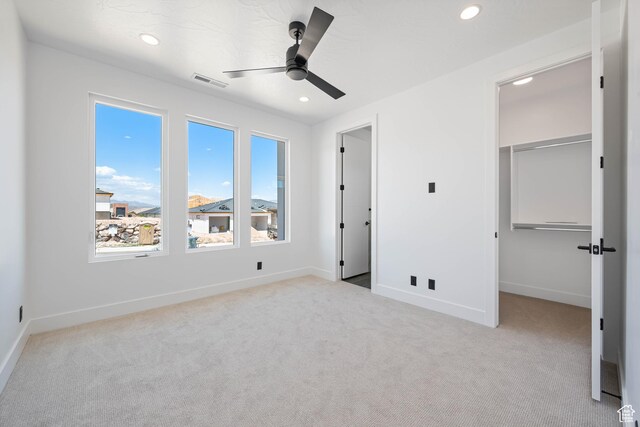 1575 W 840 S, Hurricane, UT 84737 - unfurnished bedroom featuring a spacious closet, recessed lighting, carpet, baseboards, and a ceiling fan