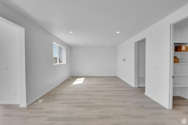 251 W 825 S Unit 306, Willard, UT 84340 - empty room with light wood-style floors, recessed lighting, and baseboards
