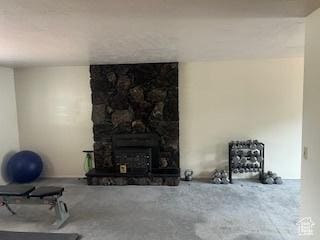 unfurnished living room with concrete flooring