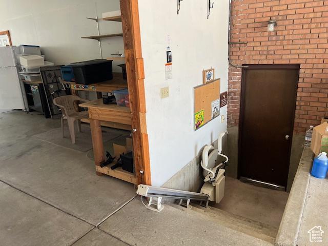 954 E 7725 S, Midvale, UT 84047 - garage featuring freestanding refrigerator