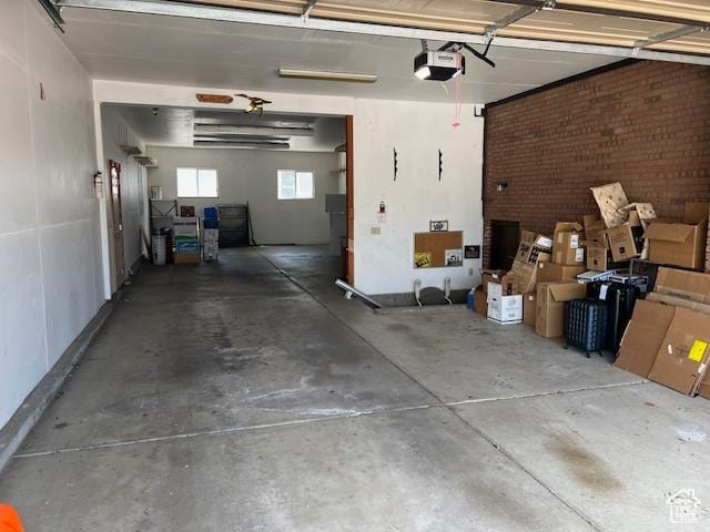 954 E 7725 S, Midvale, UT 84047 - garage featuring a garage door opener