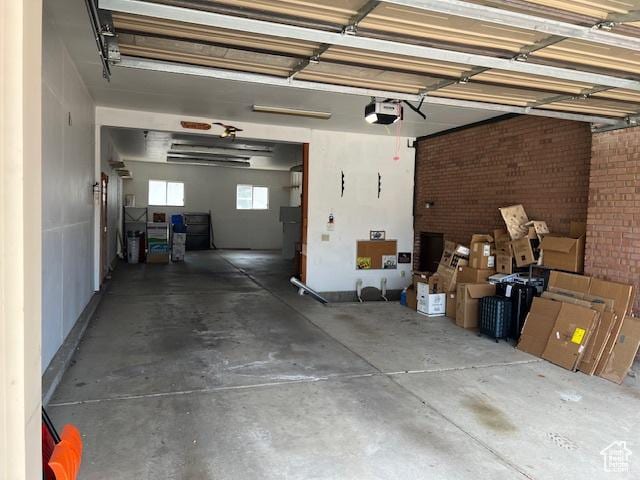954 E 7725 S, Midvale, UT 84047 - garage featuring a garage door opener