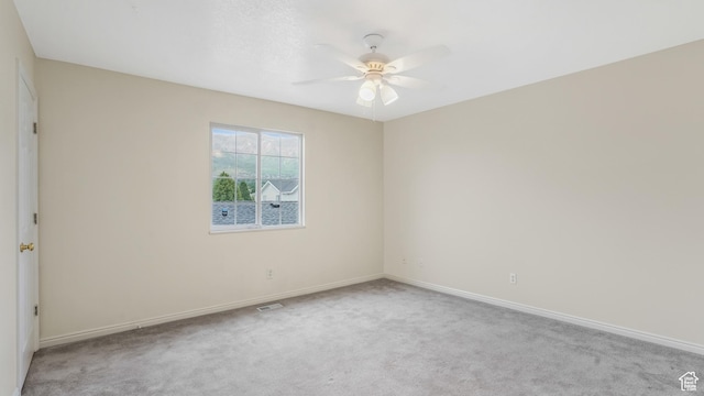 217 E 2300 N, North Ogden, UT 84414 - carpeted spare room featuring a ceiling fan and baseboards