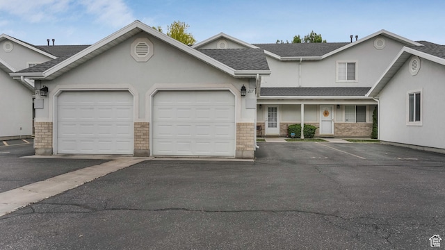 217 E 2300 N, North Ogden, UT 84414 - multi unit property with stucco siding and a shingled roof