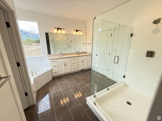 1004 E 360 N Unit 28, Salem, UT 84653 - bathroom with a shower stall, a bath, double vanity, and marble finish flooring