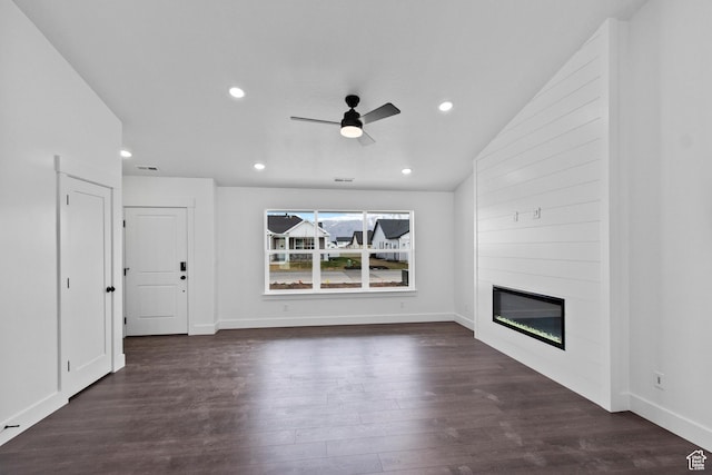 837 N 980 W Unit 66, Tremonton, UT 84337 - unfurnished living room featuring a ceiling fan, a large fireplace, dark wood-type flooring, recessed lighting, and lofted ceiling