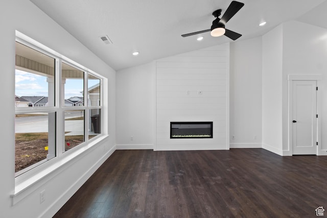 837 N 980 W Unit 66, Tremonton, UT 84337 - unfurnished living room with lofted ceiling, wood finished floors, baseboards, a fireplace, and ceiling fan