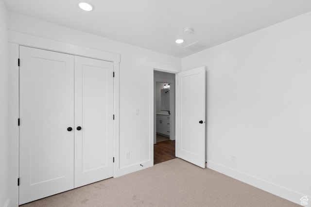837 N 980 W Unit 66, Tremonton, UT 84337 - unfurnished bedroom with carpet floors, baseboards, a closet, and recessed lighting