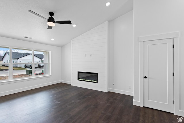 837 N 980 W Unit 66, Tremonton, UT 84337 - unfurnished living room with vaulted ceiling, wood finished floors, ceiling fan, a fireplace, and baseboards