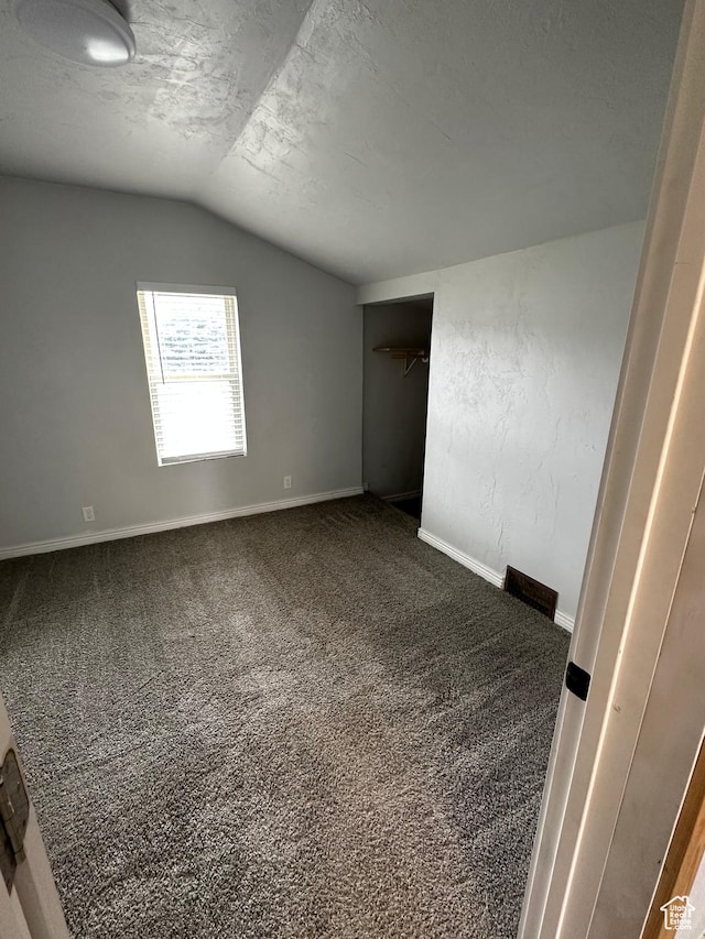 733 Clay St, Montpelier, ID 83254 - unfurnished bedroom featuring vaulted ceiling, carpet, baseboards, and a closet