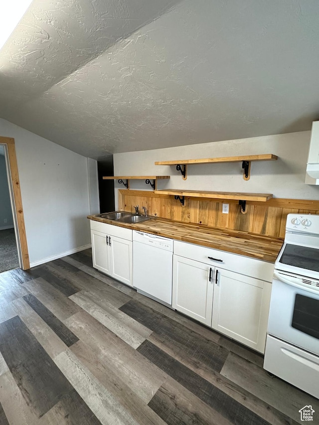 733 Clay St, Montpelier, ID 83254 - kitchen featuring white appliances, open shelves, wood counters, a sink, and a textured ceiling