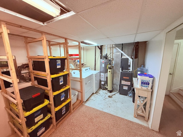 5582 W Joshua Cir S, West Jordan, UT 84081 - storage area featuring washing machine and clothes dryer, gas water heater, and heating unit