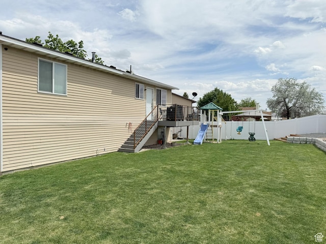 5582 W Joshua Cir S, West Jordan, UT 84081 - view of yard with a playground, stairway, and a deck