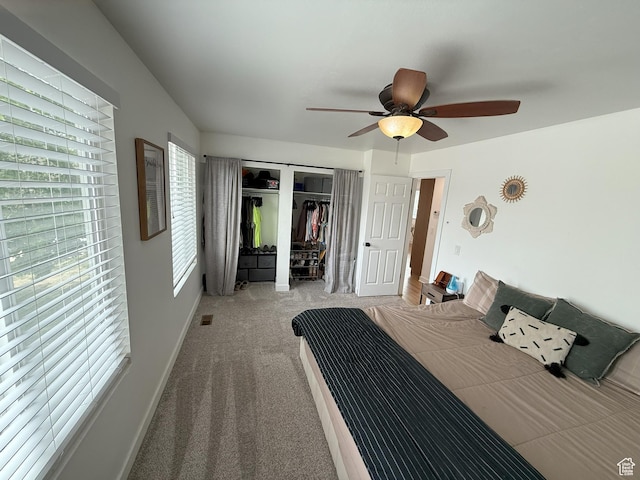 5582 W Joshua Cir S, West Jordan, UT 84081 - carpeted bedroom with a closet and a ceiling fan